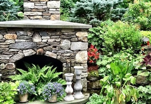 Landscape and Stonework Outdoor Fireplace by New View, Inc. Landscape and Stonework Outdoor Fireplace by New View, Inc.