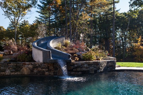 Pool with Slide, Travertine and Fieldstone by New View