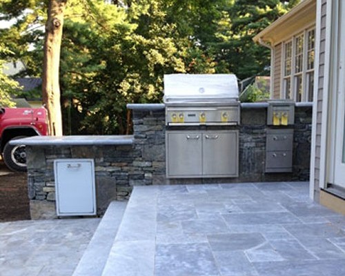Stone Bar on Travertine Patio Steps with Built in Grill, Refrigerator and Side Burner