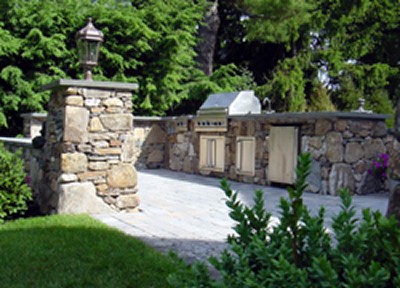 Stone Bar with Built in Grill and Stone Posts by New View