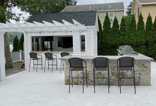 Stone bar with pergola by New View