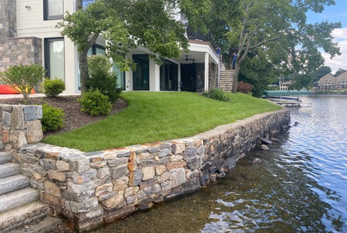 Retaining wall and steps to lake by New View