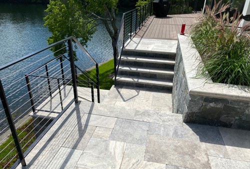Travertine patio to multi-level steps by New View